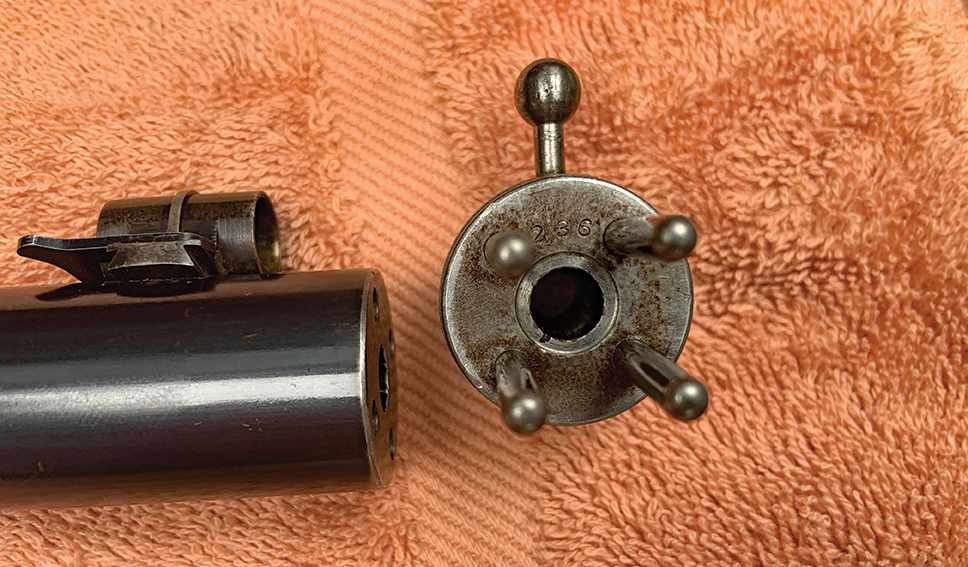Matching serial numbers on the barrel and false muzzle.
